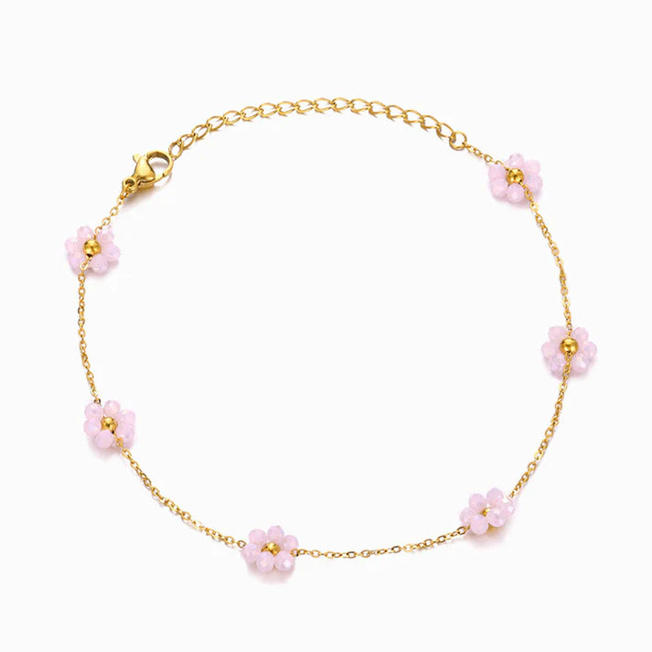 Pulseira em Aço Dourado com Flores Brancas