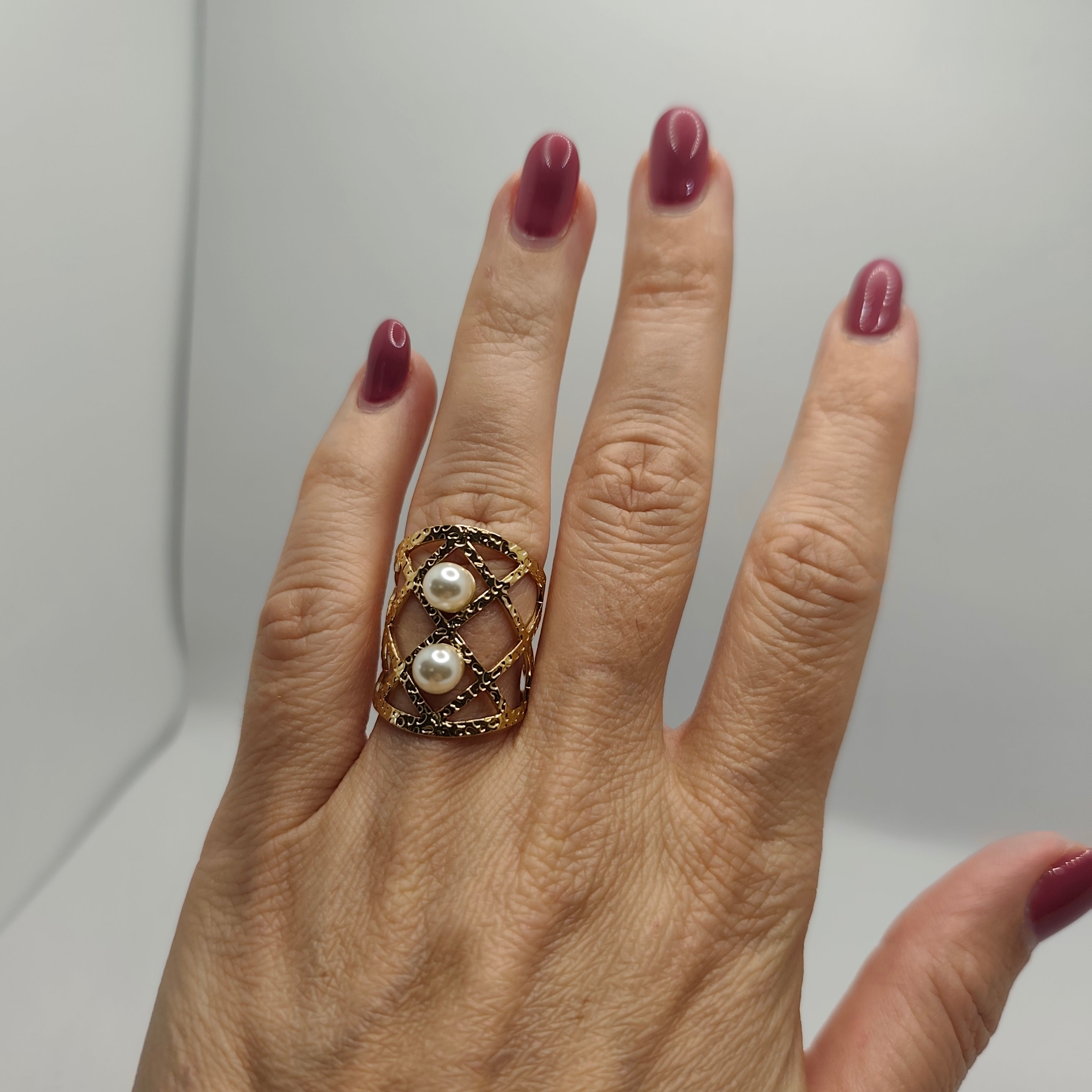 Anel Aço Dourado Pérolas