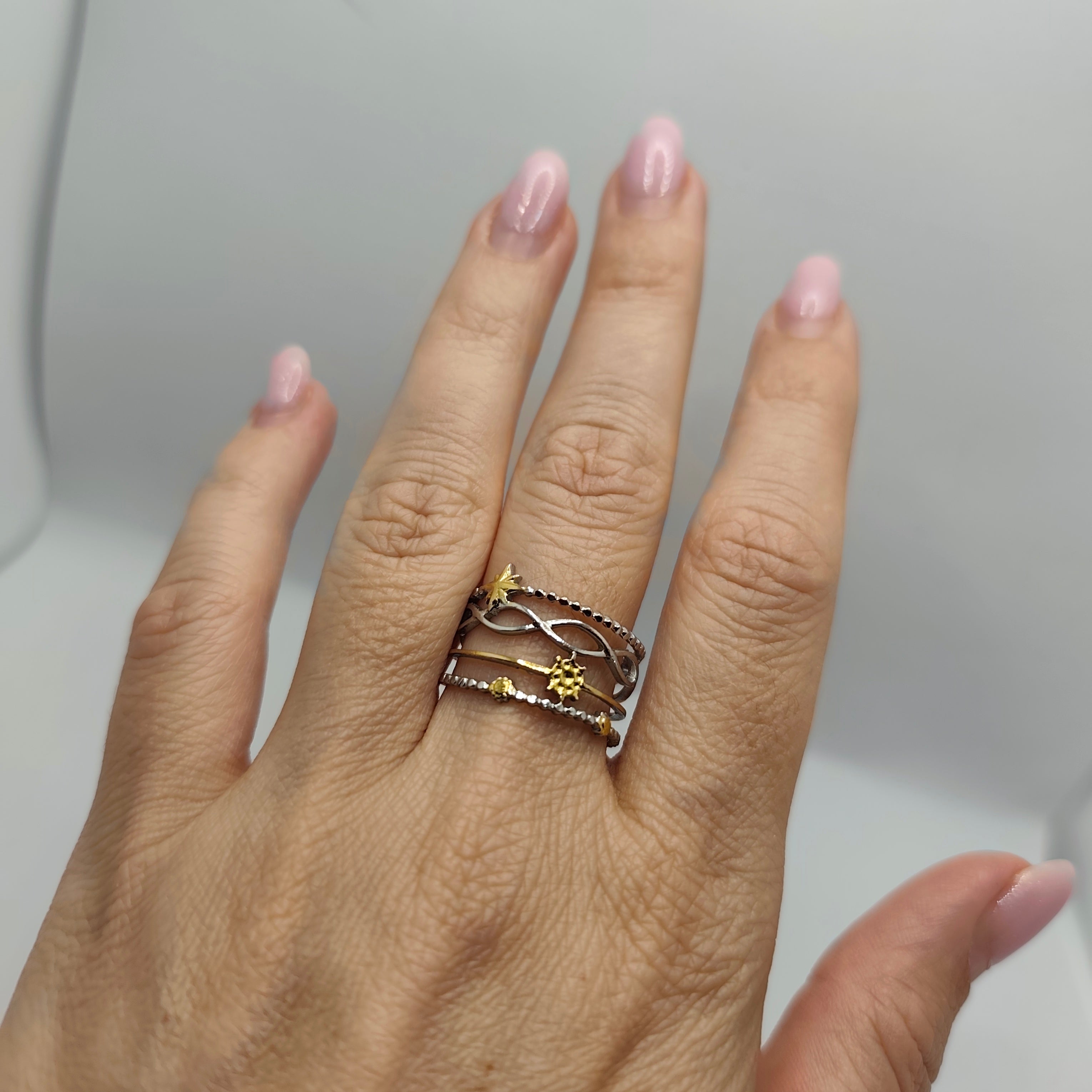 Anel Aço Dourado e Prateado Charme
