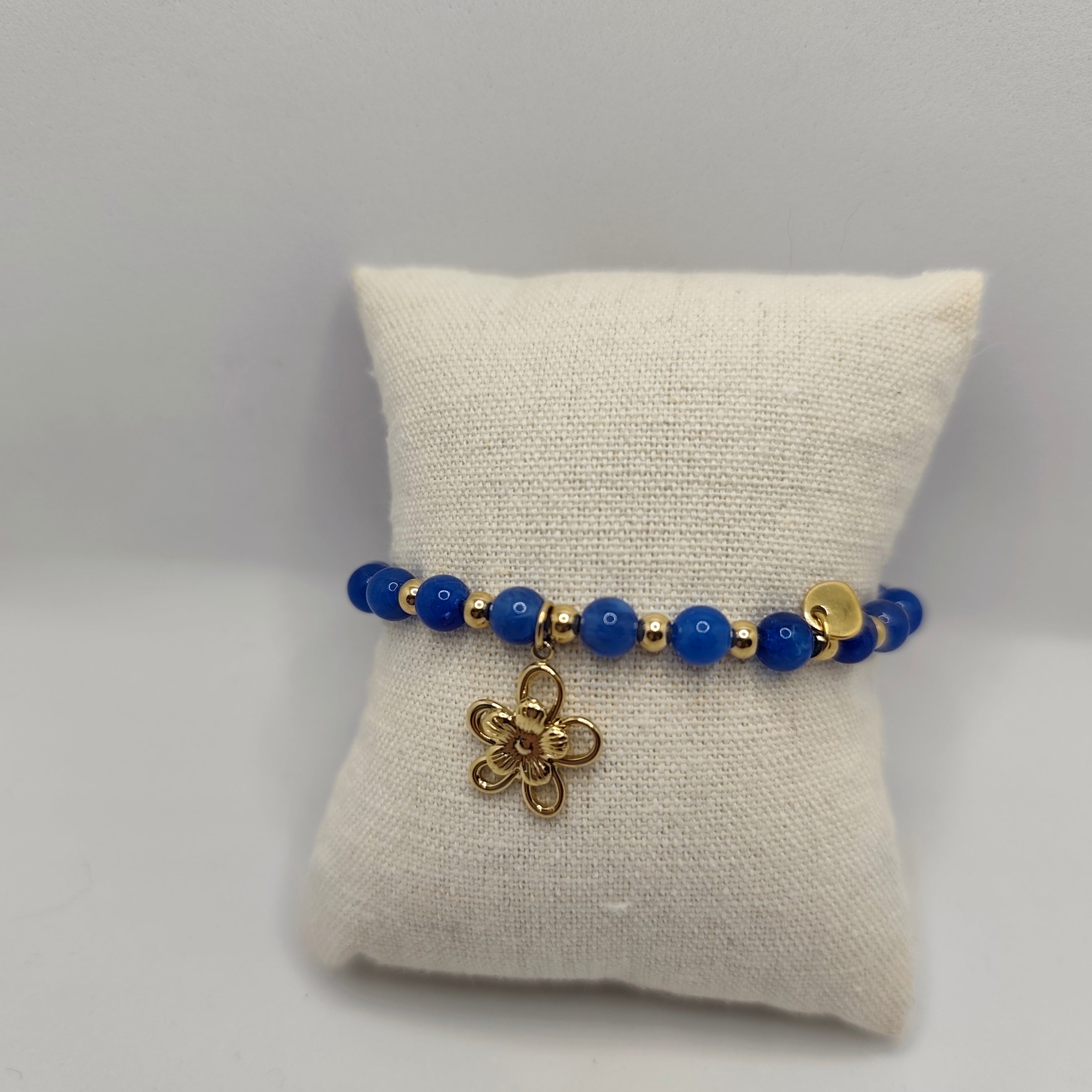 Pulseira Aço Dourado e Pérolas Azuis (Elástica)