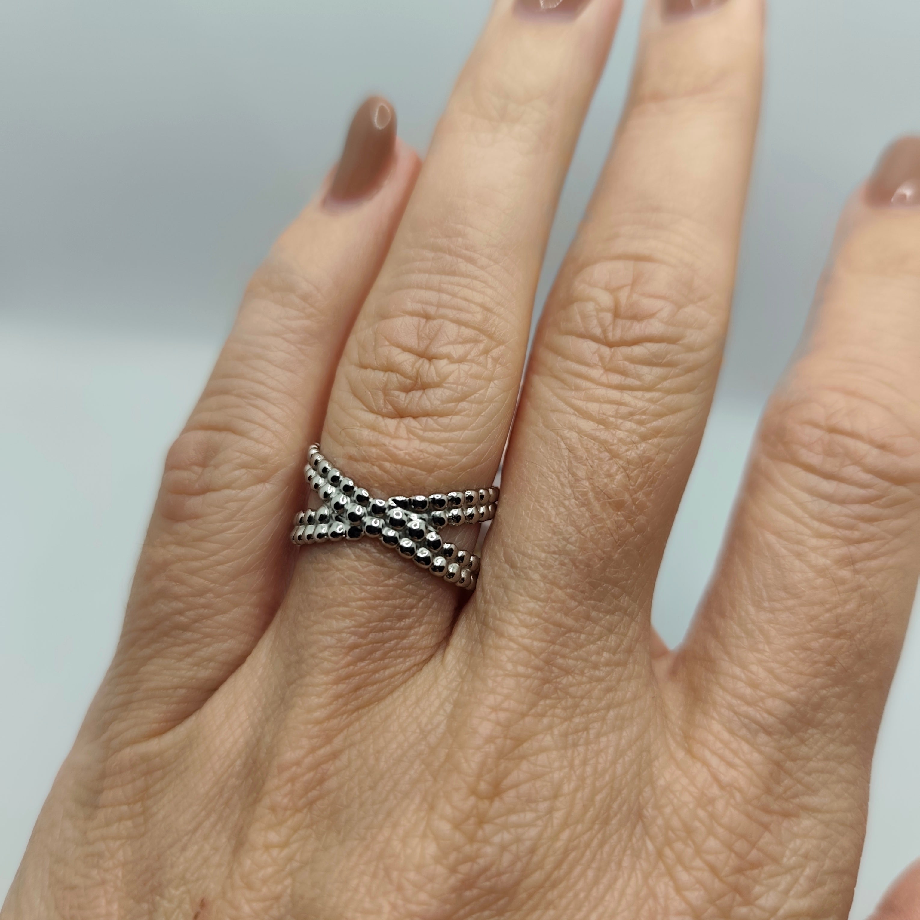 Anel Aço Prateado Cruzado