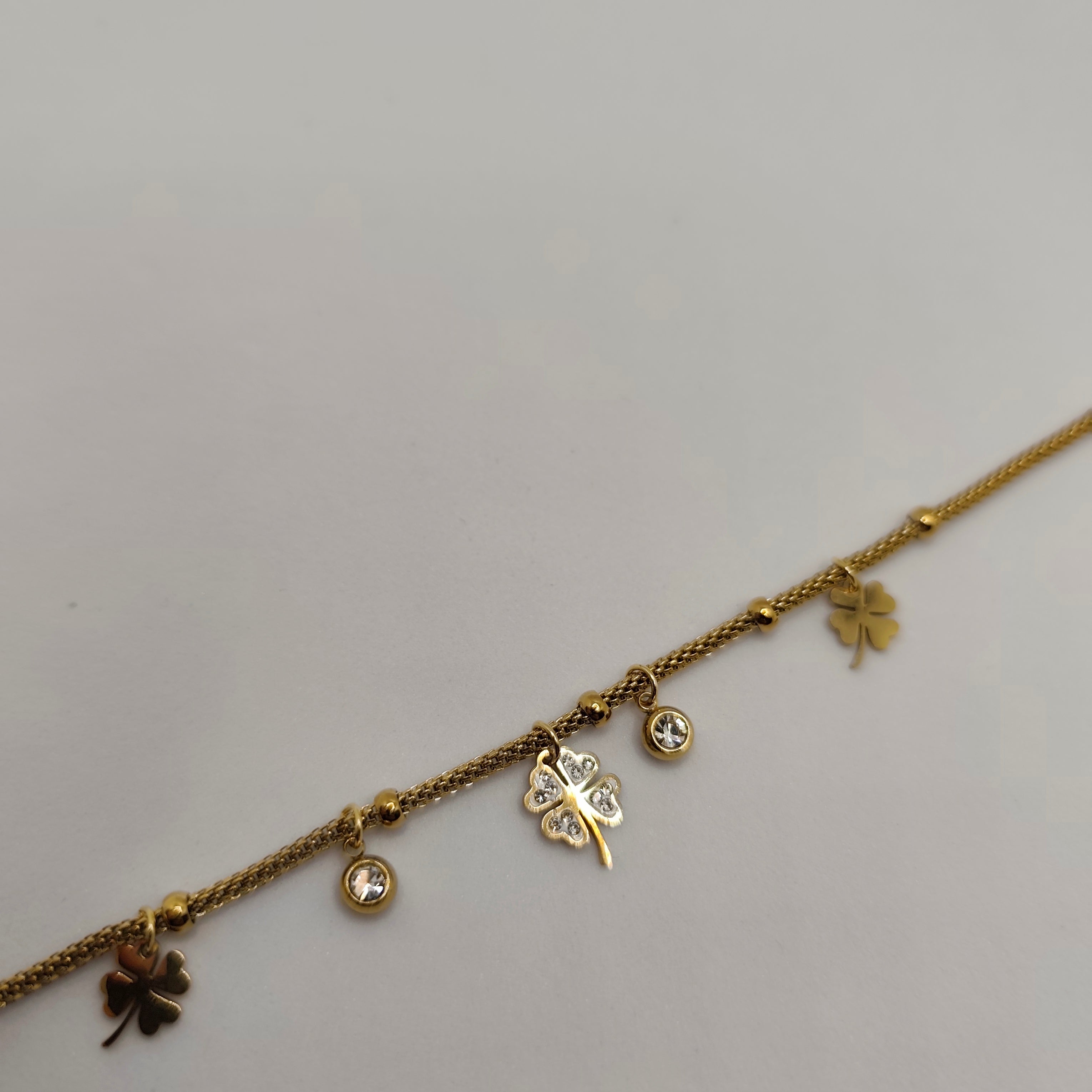 Pulseira Aço Dourado Trevo e Zircónias