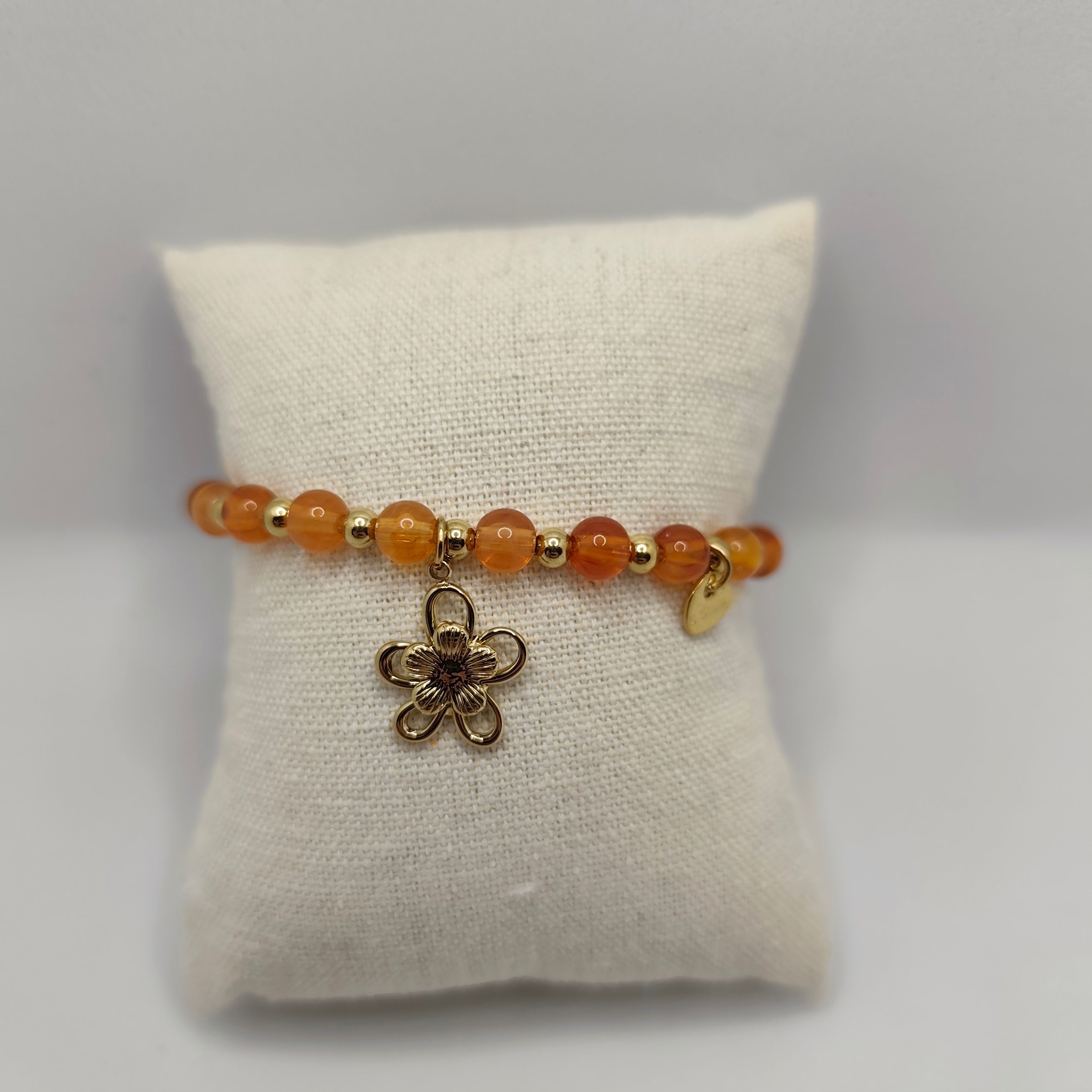 Pulseira Aço Dourado e Pérolas Laranja (Elástica)