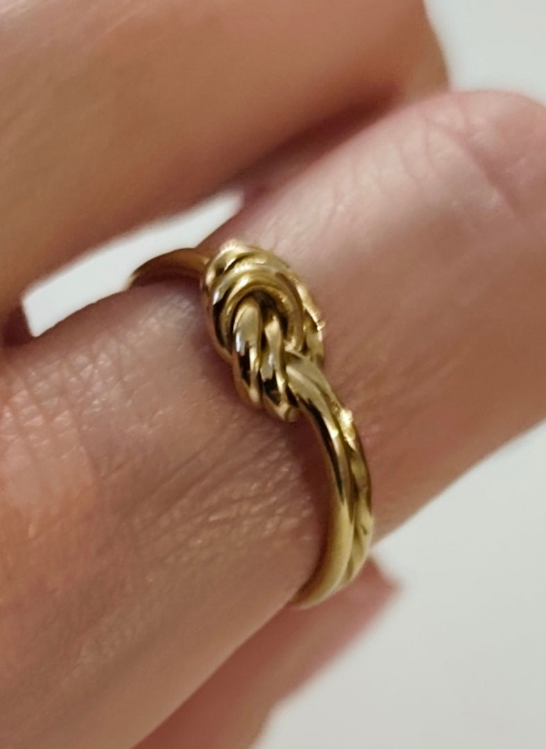 Anel Aço Dourado Nó